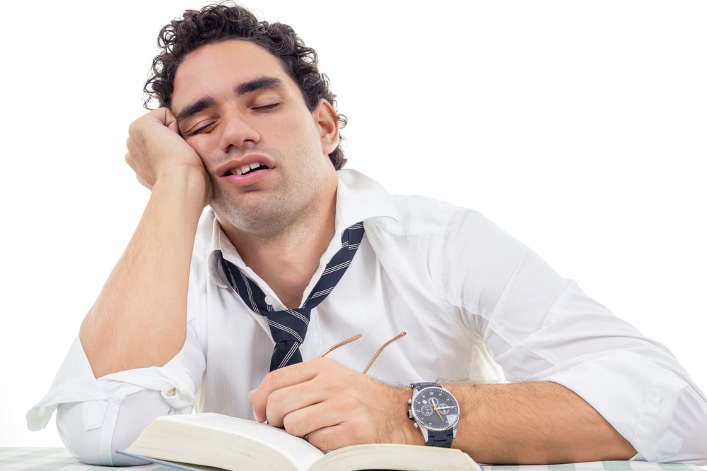 Shutterstock176786162 Sleepy And Tired Man With Glasses In White Shirt